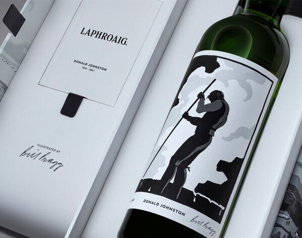 Close up image of a bottle of Laphroaig 33 Year Old Strong Characters inside presentation box.