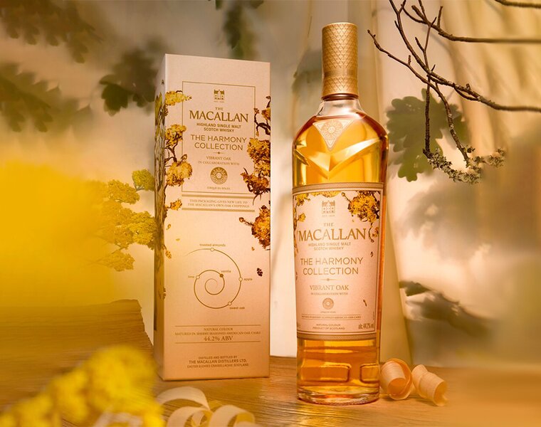A bottle of The Macallan Harmony Collection Vibrant Oak with presentation box