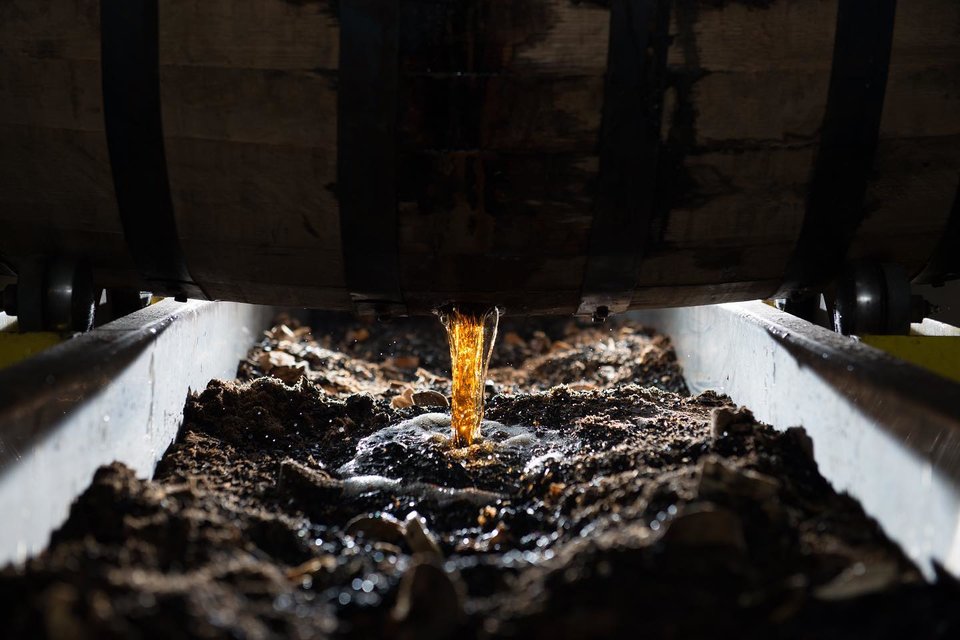 Whisky coming out of a barrel