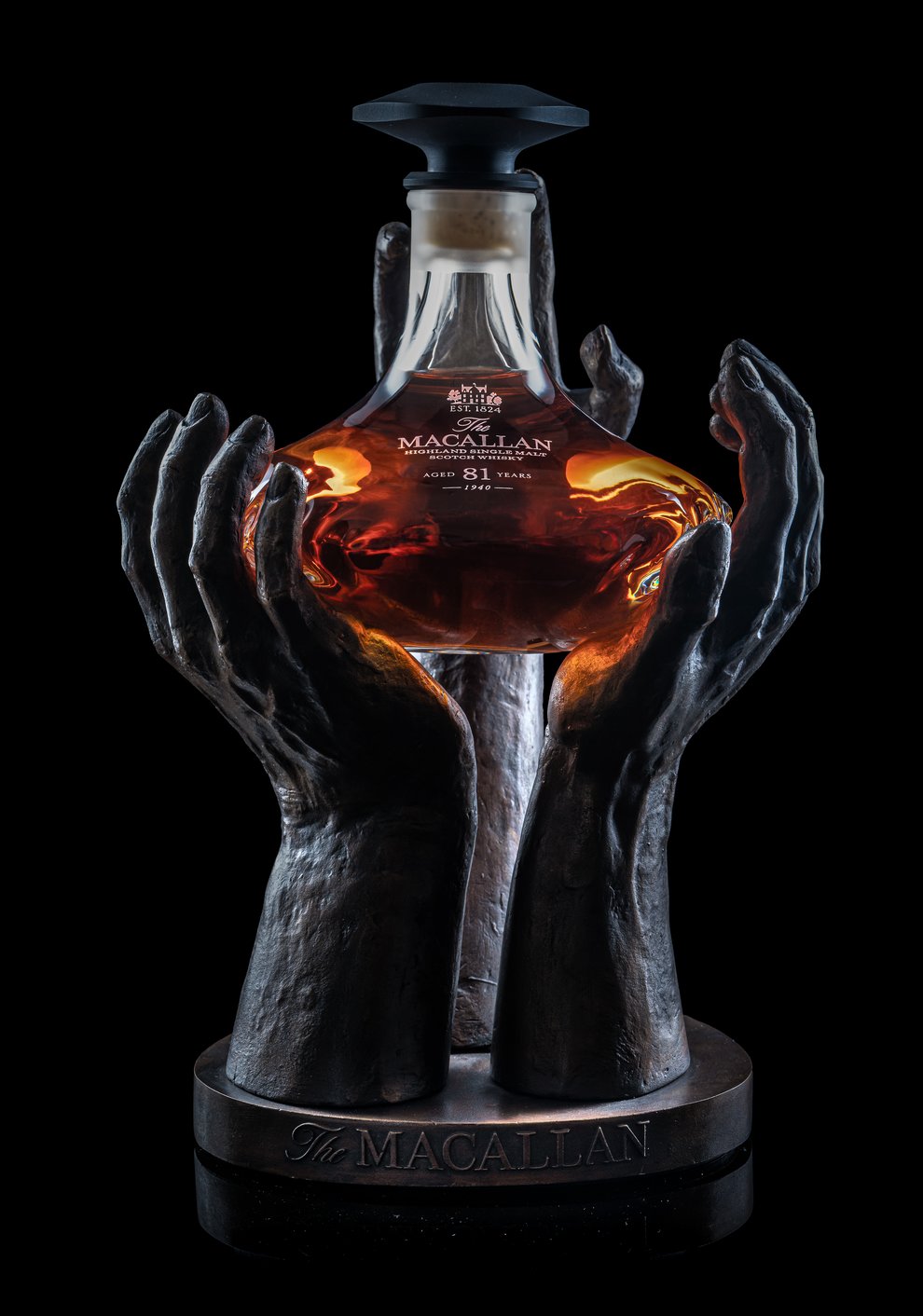 Decanter of Macallan Reach whisky on bronze stand
