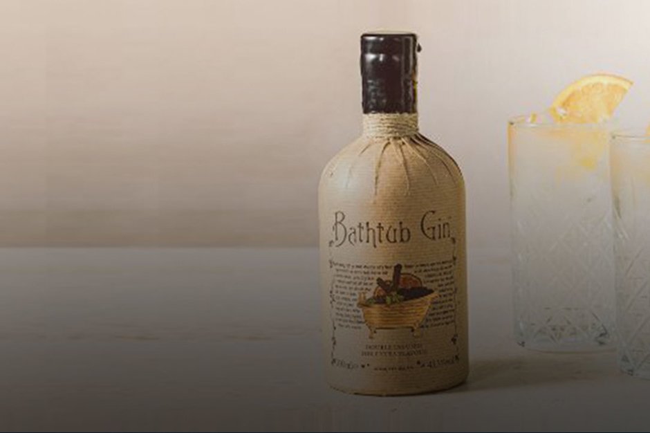 A bottle of Bathtub gin with a highball cocktail