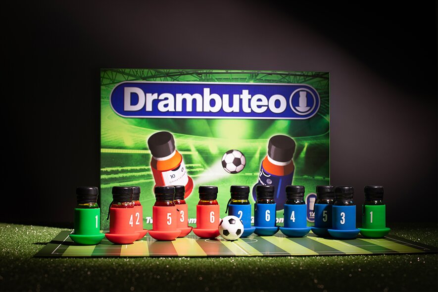 Drambuteo box and drams on a grass pitch.