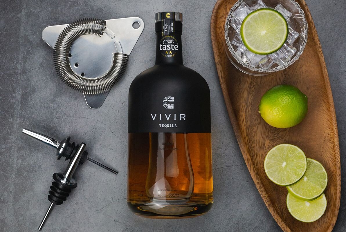 A bottle of VIVIR Tequila Añejo