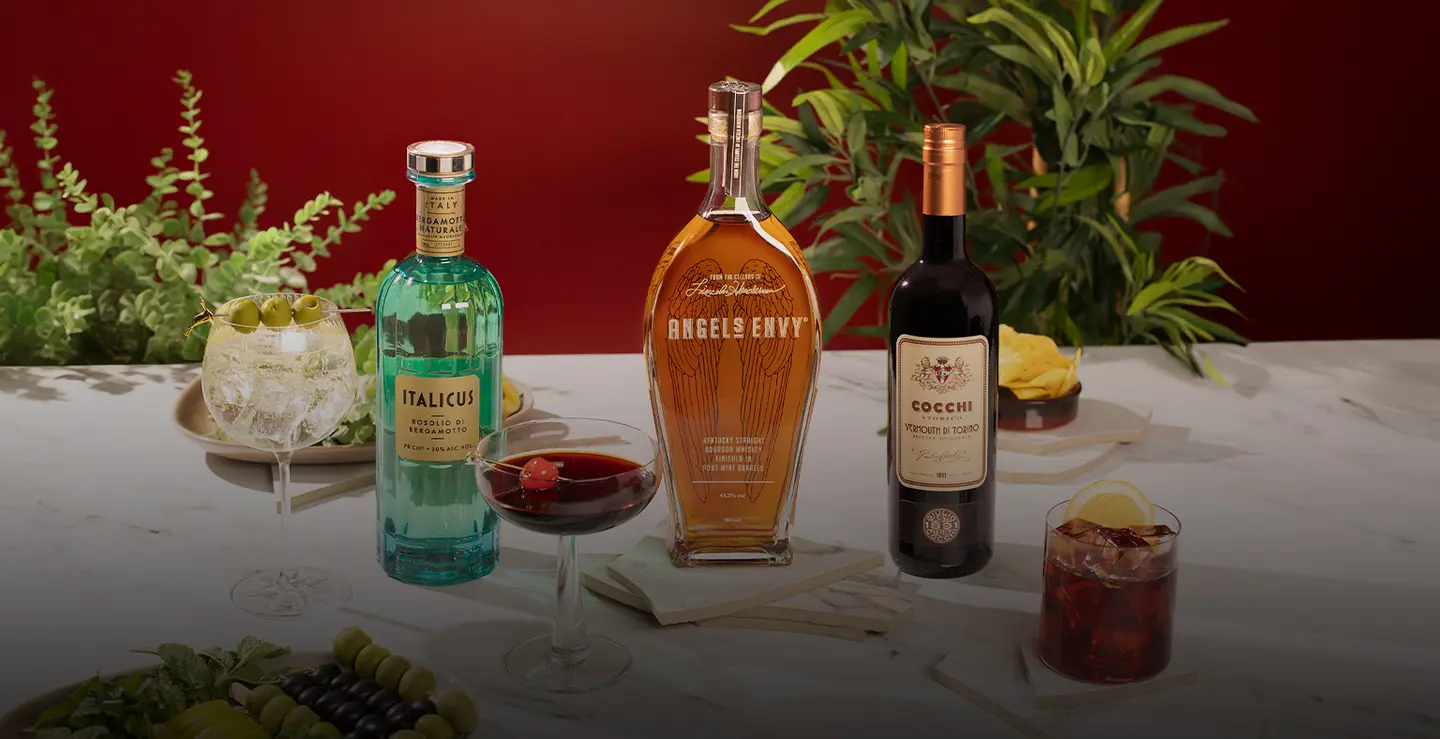 Bottles of Italicus, Angel's Envy and Cocchi VDT with a spritz and a Manhattan.