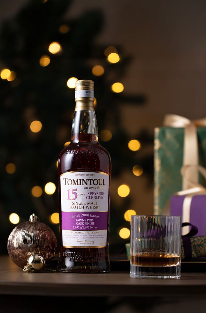 Tomintoul 15 Year Old 2008 Tawny Port Cask Finish whisky bottle with Christmas background