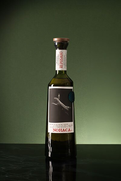 A bottle of Nohaca Reposado Tequila