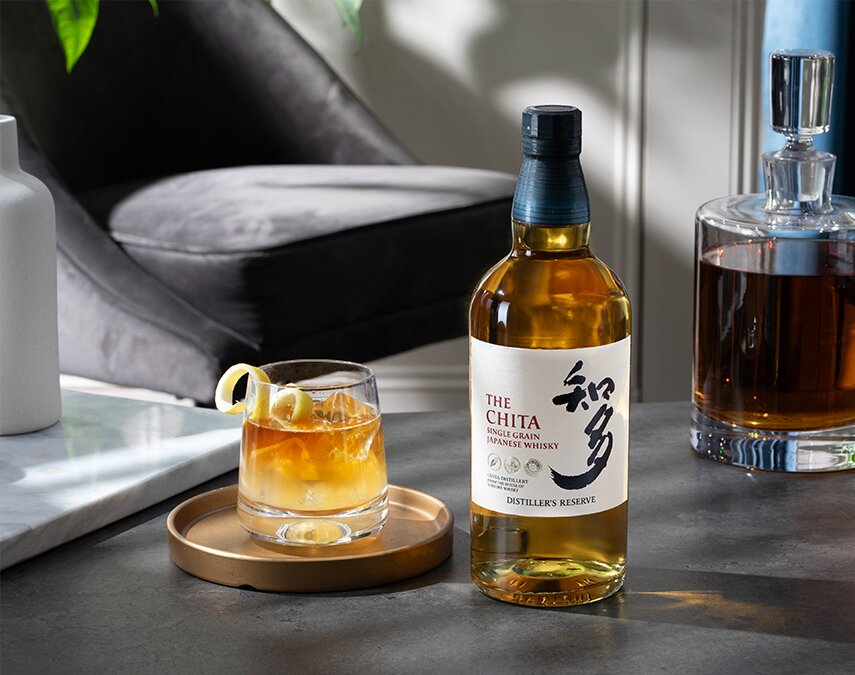 A bottle of Chita Single Grain and cocktail