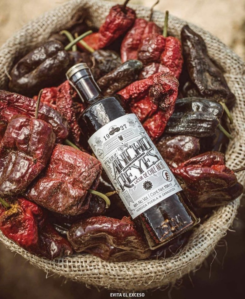 A bottle of Ancho Reyes Chile Liqueurs