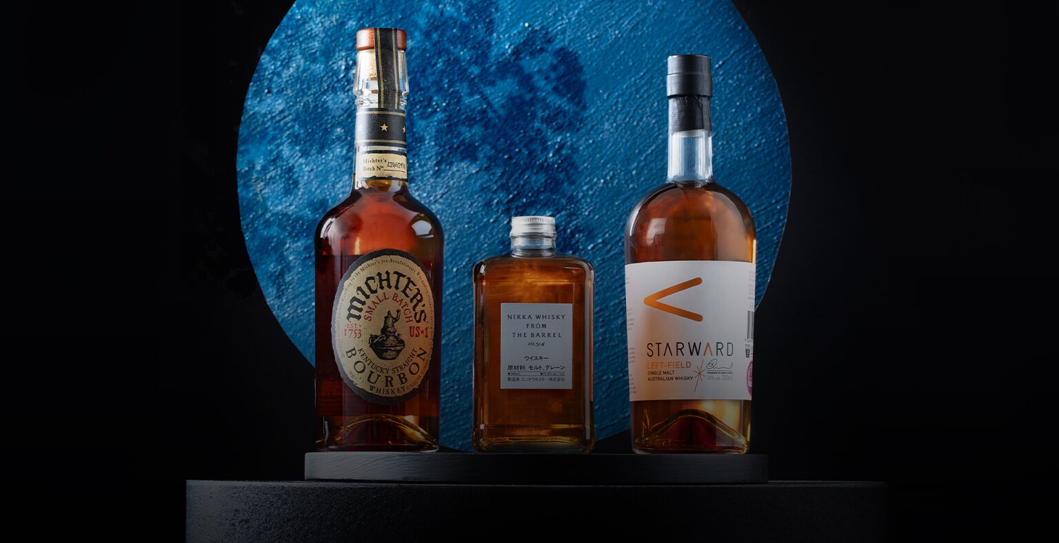 Three bottles of whisky; Nikka from the Barrel, Michters Rye and Starward Left-Field.