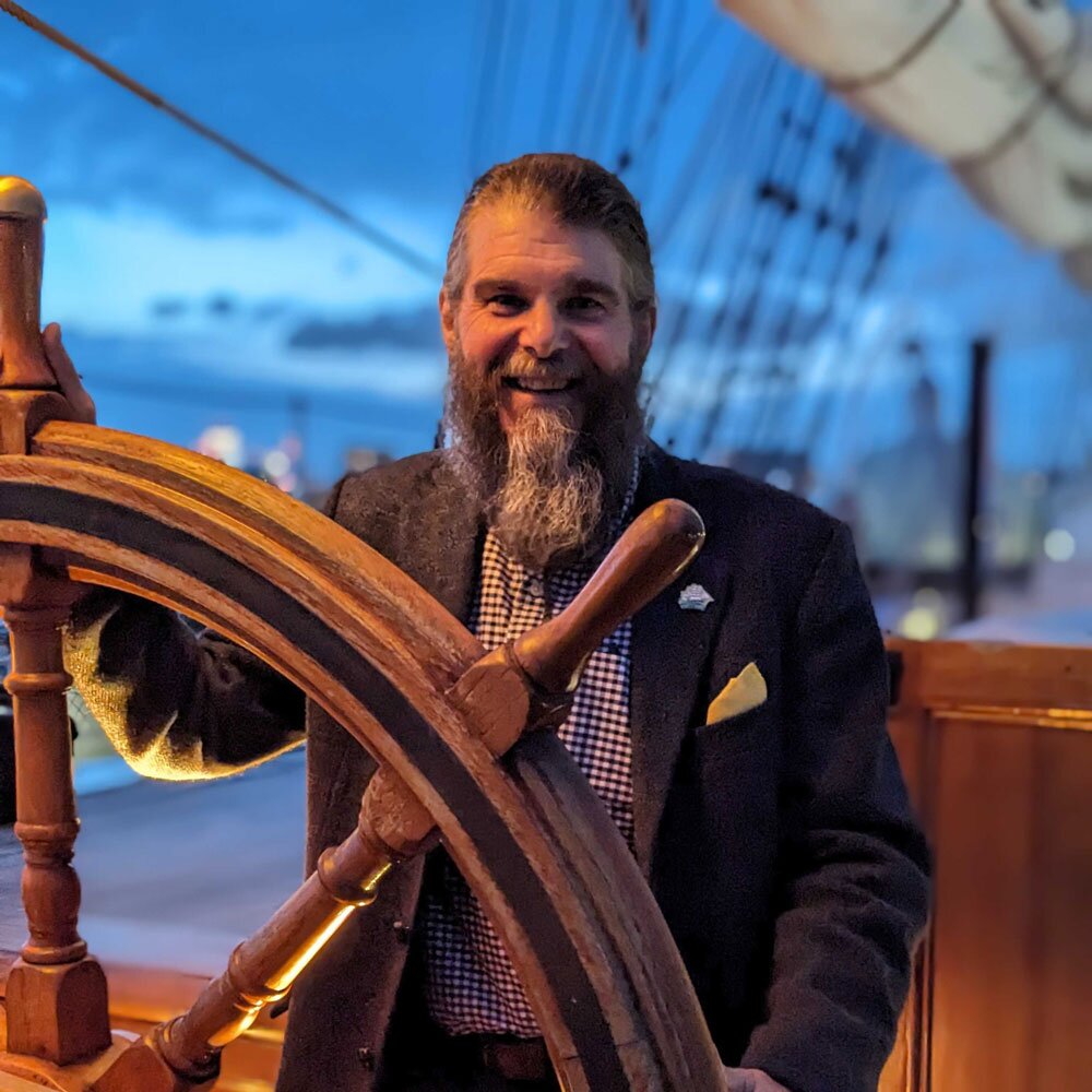 Dave Worthington at the steering wheel of the Cutty Sark