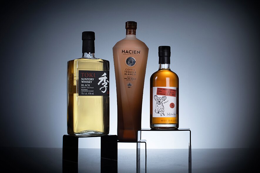 A bottle of Toki black, Hacien Coffee Tequila, and Balmenach 15 Year Old - Badly Drawn Dogs