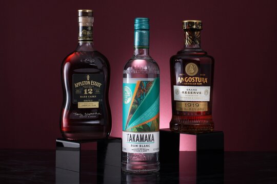 Three bottles of rum, Appleton Estate, Takamaka and Angostura 
