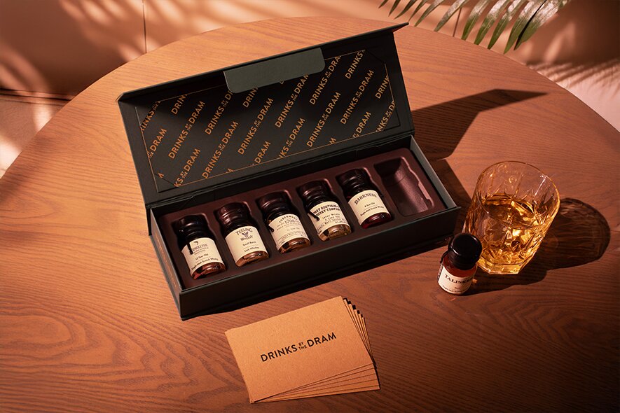 A tasting set on a wooden table.