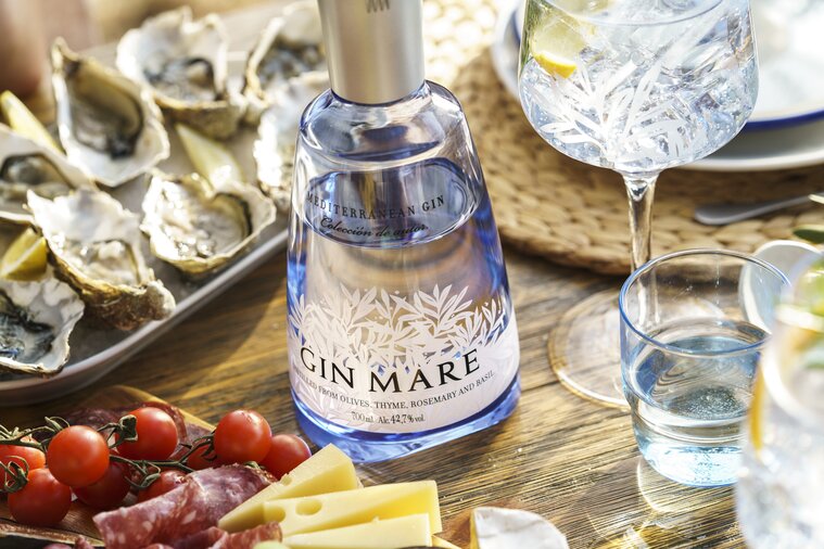 A bottle of Gin Mare with oysters 