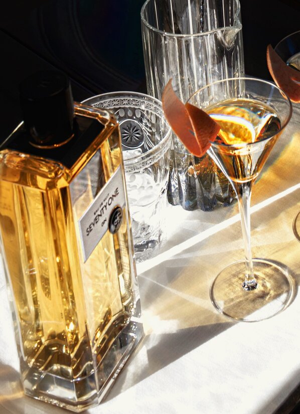A bottle of SEVENTY ONE Gin and a cocktail.