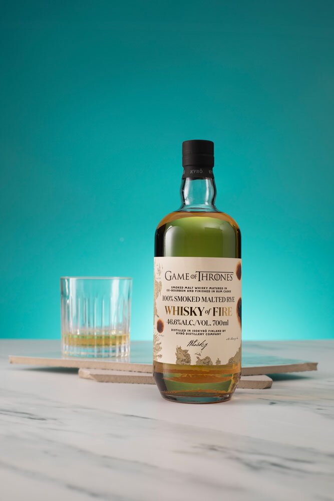 Kyrö Whisky Of Fire (Game of Thrones) bottle with rocks glass