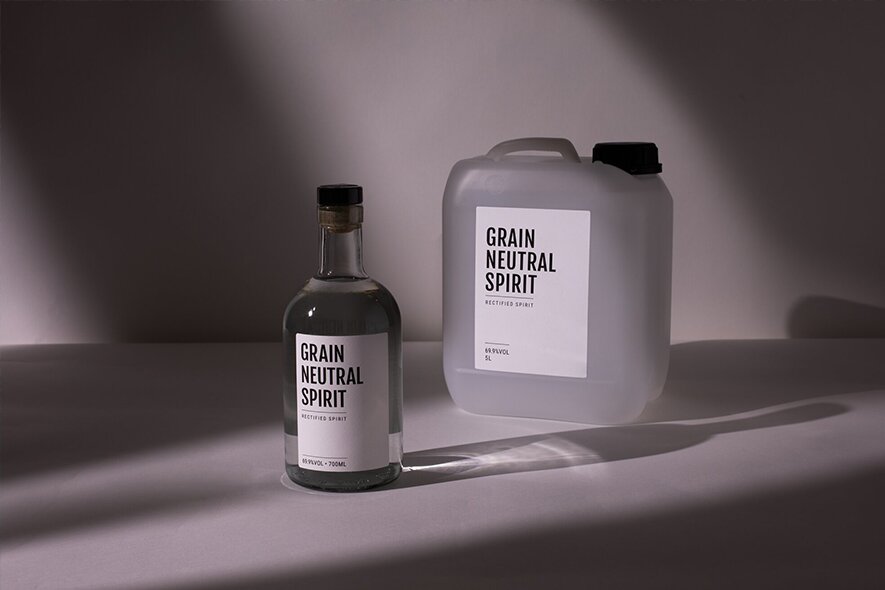 A bottle of Grain Neutral Spirit in white background with shadows 