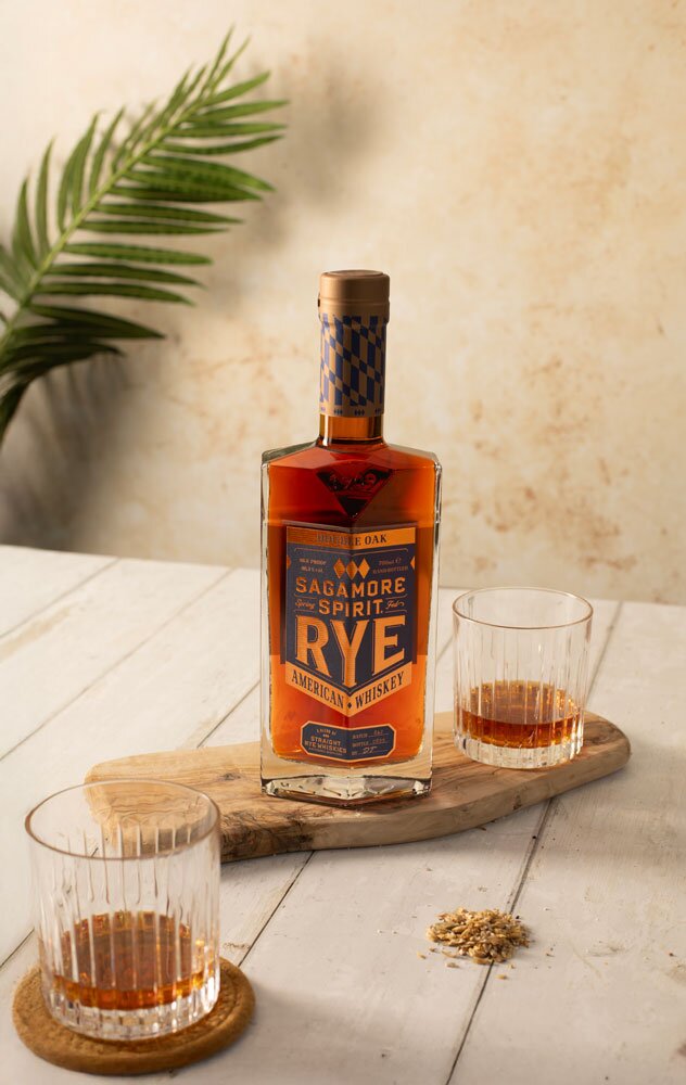Sagamore Spirit Double Oak Rye whiskey bottle with two rocks glasses