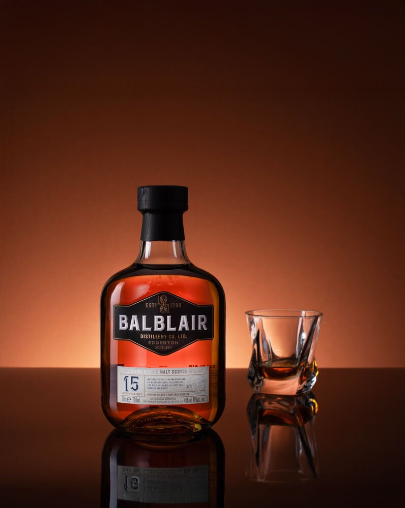Balblair 15 Year Old whisky bottle with glass