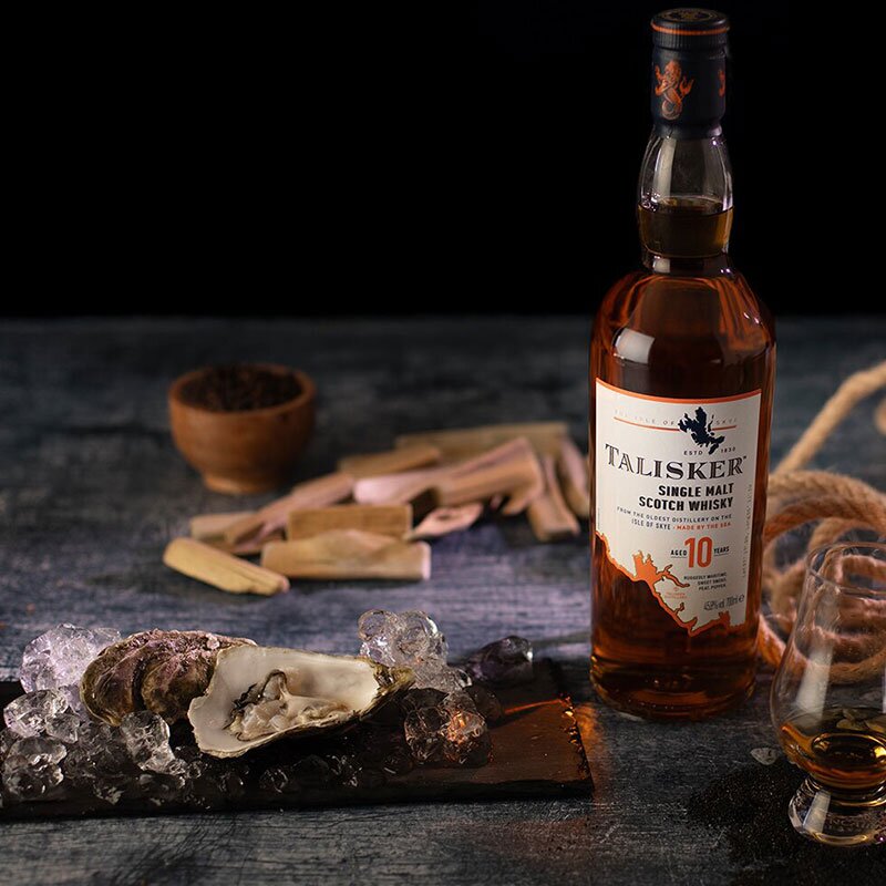 A bottle of Talisker 10 Year Old with Oysters and Black Pepper