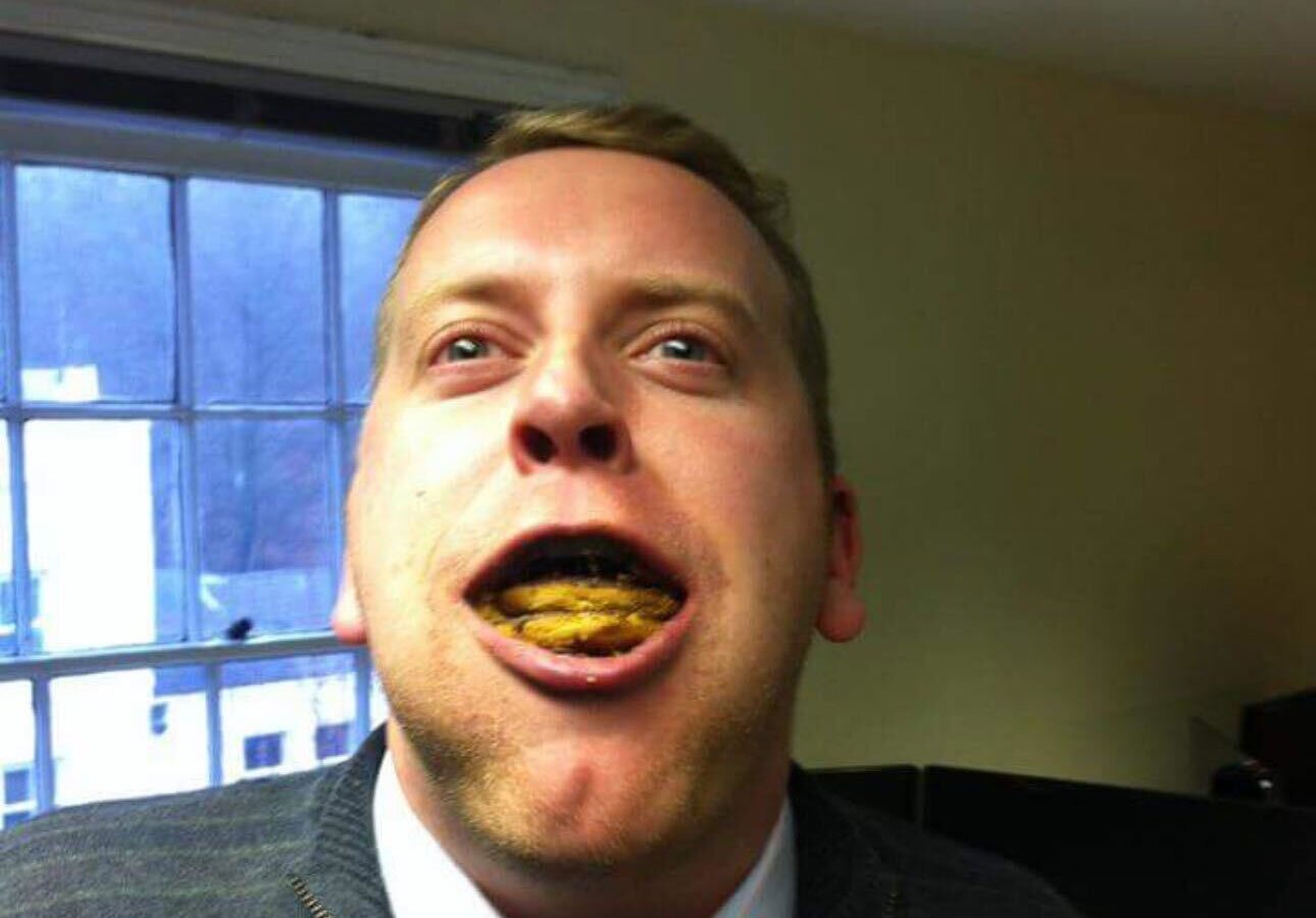 Tom trying to fit as many Jaffa Cakes in his mouth as possible