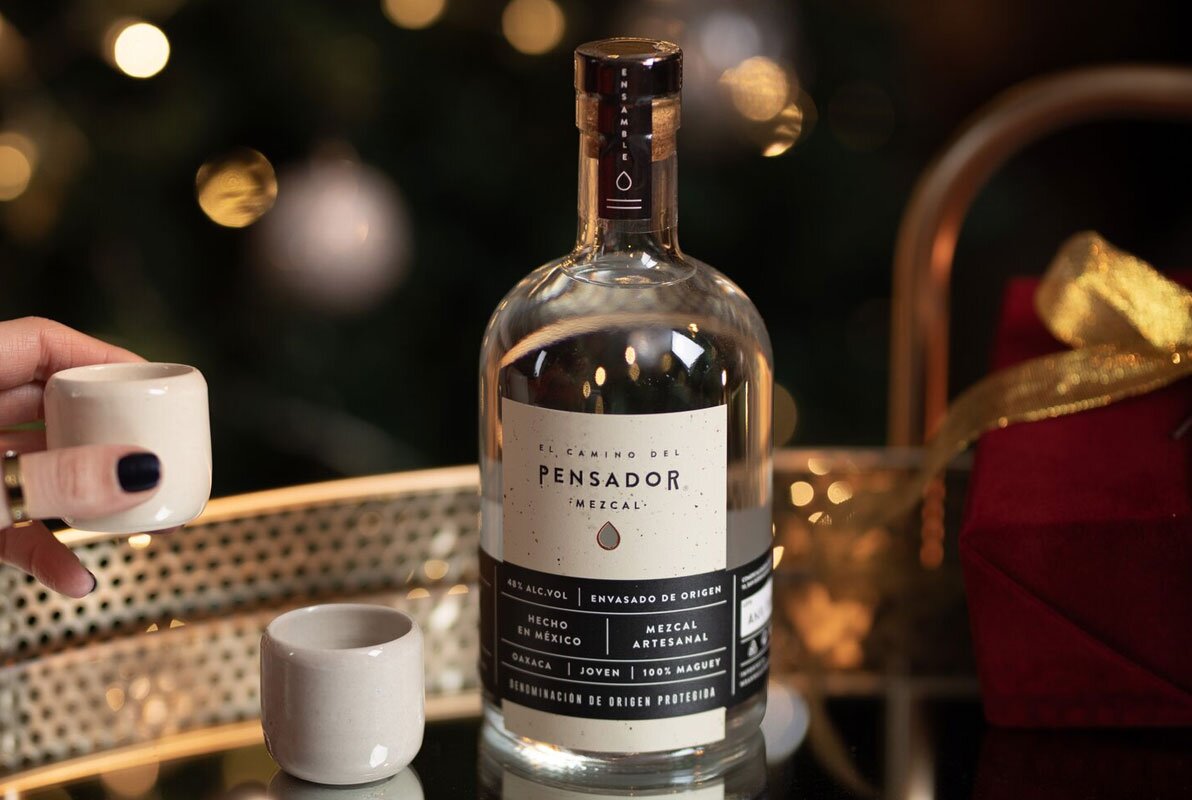 A bottle of Pensador Ensamble Mezcal
