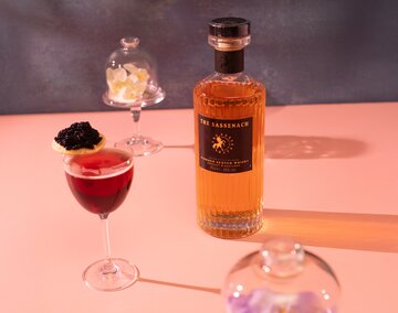A bottle of The Sassenach Blended Scotch Whisky.