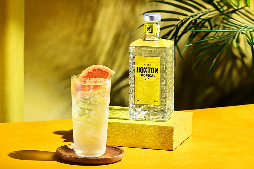 A bottle of HOXTON tropical gin.
