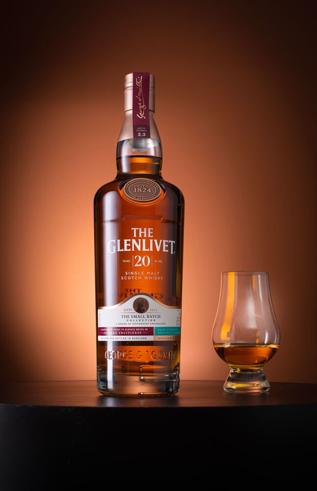 The Glenlivet Small Batch 2.3 20 Year Old whisky bottle with tasting glass