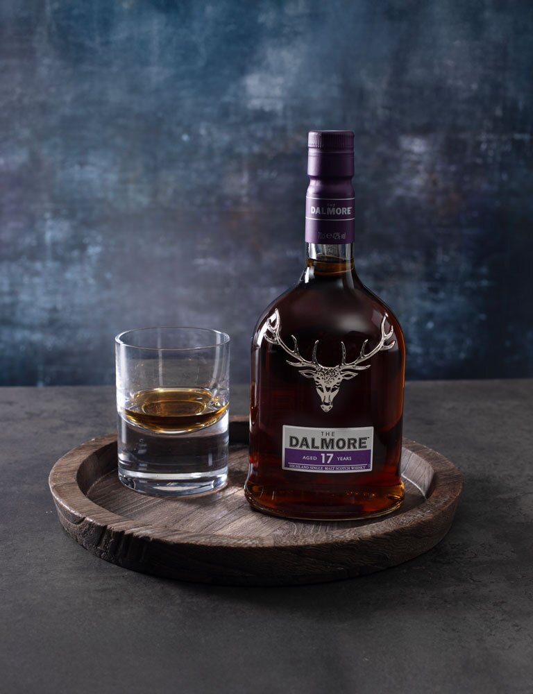 The Dalmore 17 Year Old whisky bottle with glass