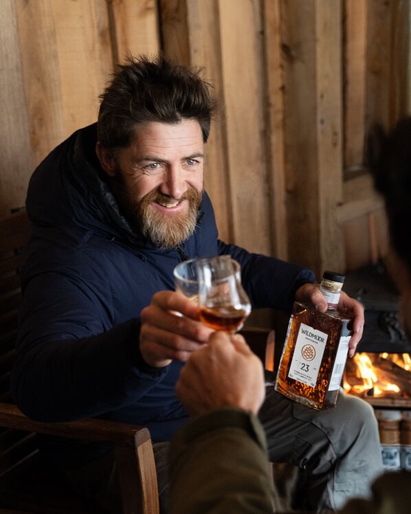 Aldo Kane and bottle of Wildmoor 23