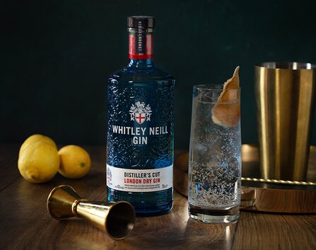 A bottle of Whitley Neill Distillers Cut with a Gin & Tonic.