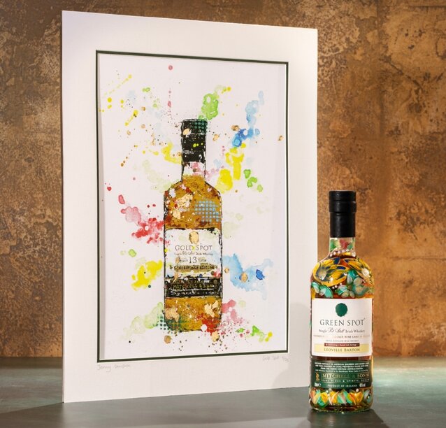 Gold spot bottle and artwork