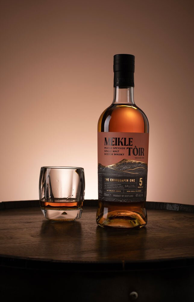 Meikle Tòir The Chinquapin One whisky bottle with tumbler glass