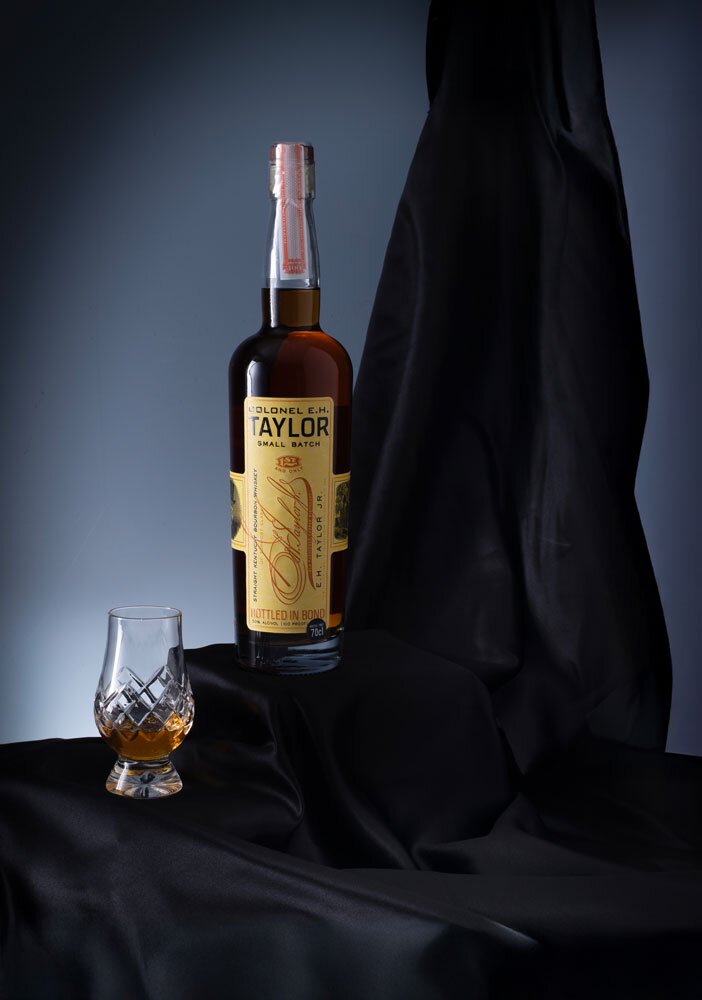 Colonel EH Taylor Small Batch whiskey bottle with glass