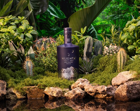 A bottle of Mijenta Tequila Añejo