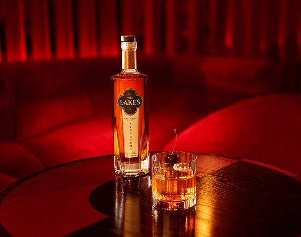 A bottle of The Lakes Signature Single Malt with their signature Nocturne cocktail.