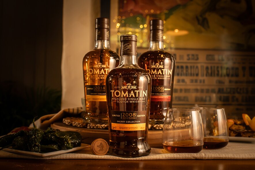 Three bottles of Tomatin whisky
