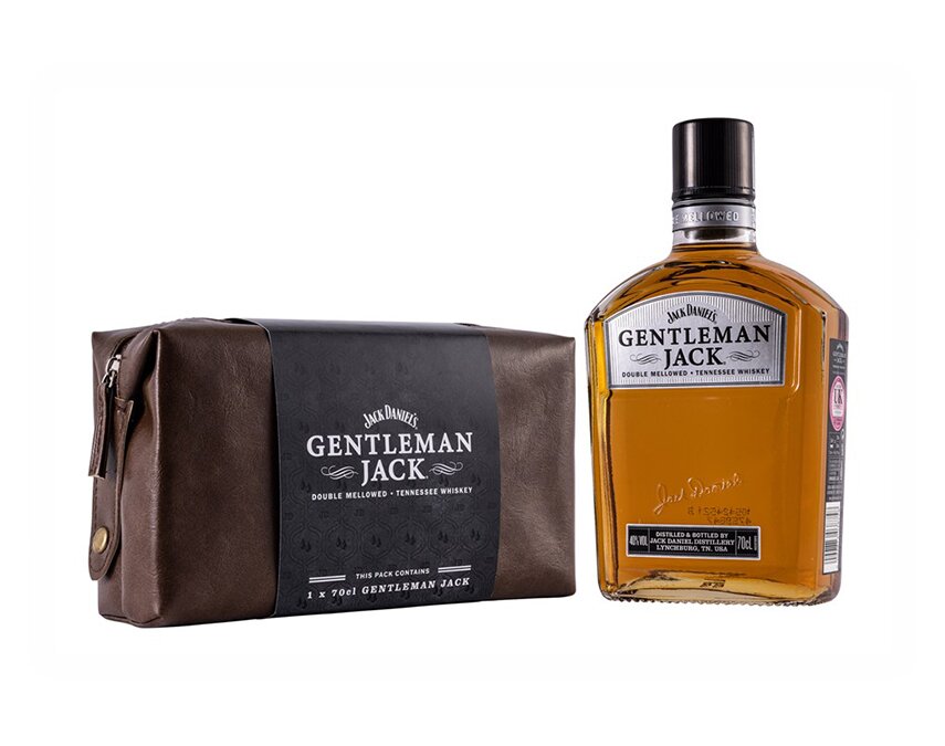A bottle of Jack Daniel's Gentleman Jack and washbag