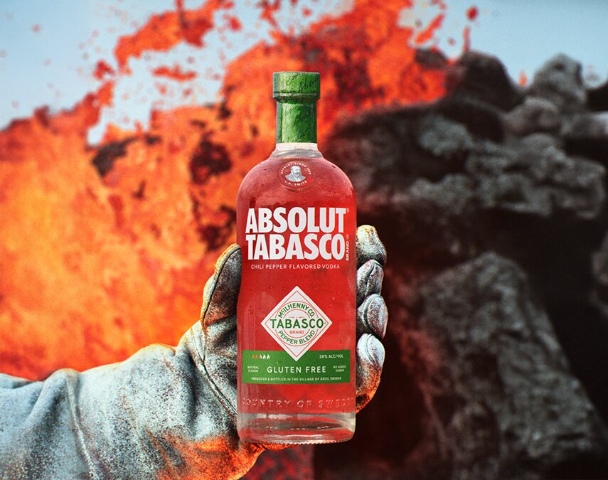 A bottle of Absolut Tabasco and a bloody mary cocktail.
