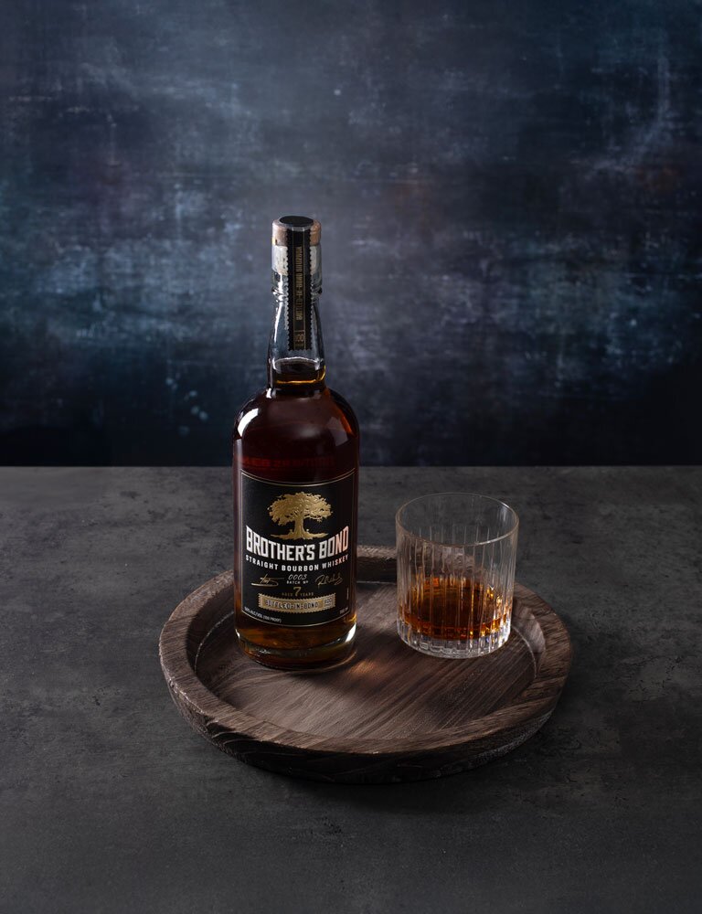 Brother's Bond Bottled in Bond 7 Year Old Straight Bourbon whiskey bottle with tumbler glass