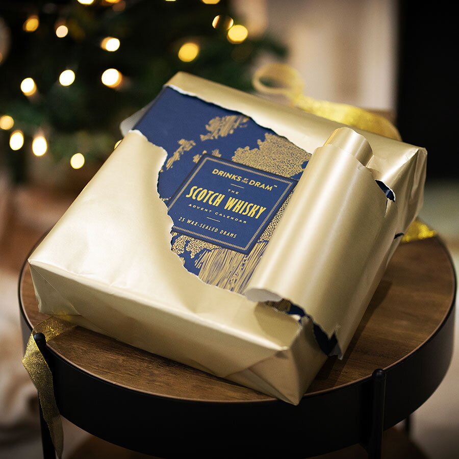 A Scotch Whisky advent calendar being opened