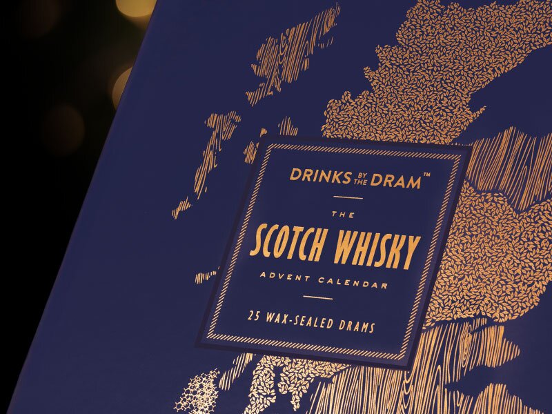 A glass of whisky with ice. 