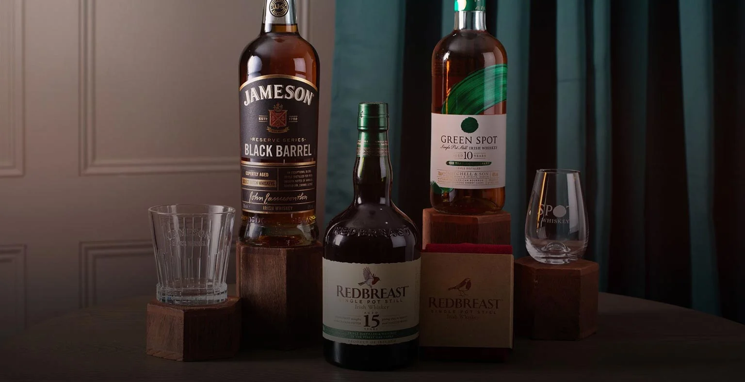 A bottle of Green Spot, Redbeast 15 and Jamesons Black Barrell Irish Whiskey.