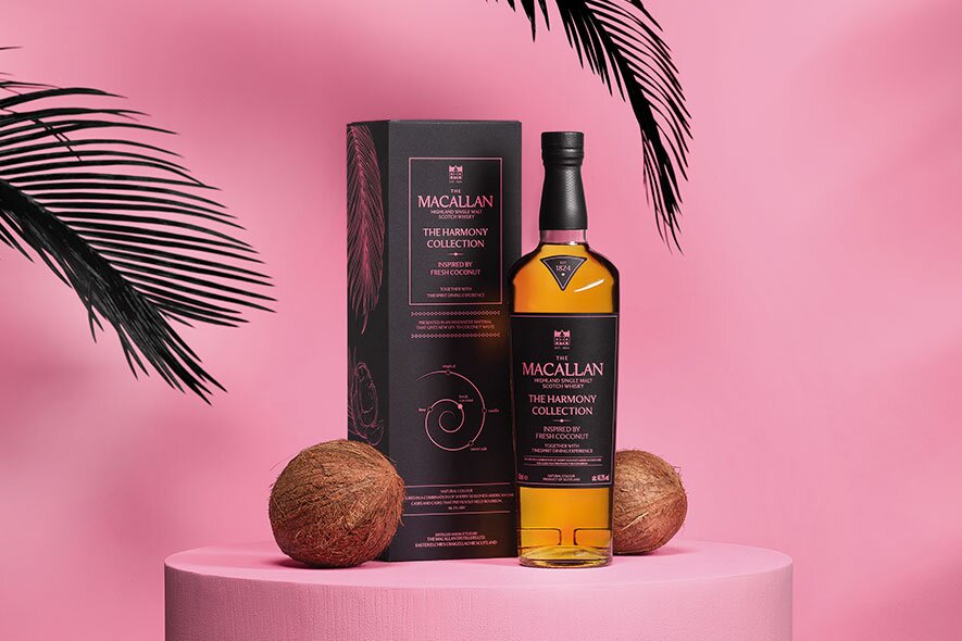 Three bottles of Macallan whisky and 2 glasses. 