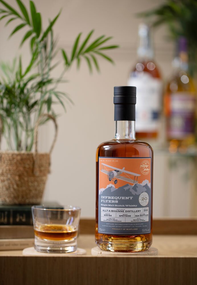 Allt-a-Bhaine 20 Year Old 2005 (cask 805184) - Infrequent Flyers (Alistair Walker) whisky bottle with glass