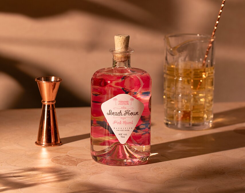 A bottle of Beach House Pink Spiced Rum.