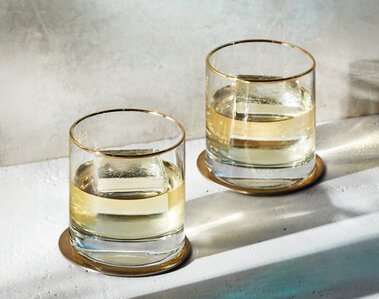 Two glasses of Patrón El Alto Tequila.