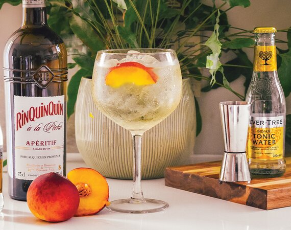 A bottle of RinQuinQuin à la Pêche.