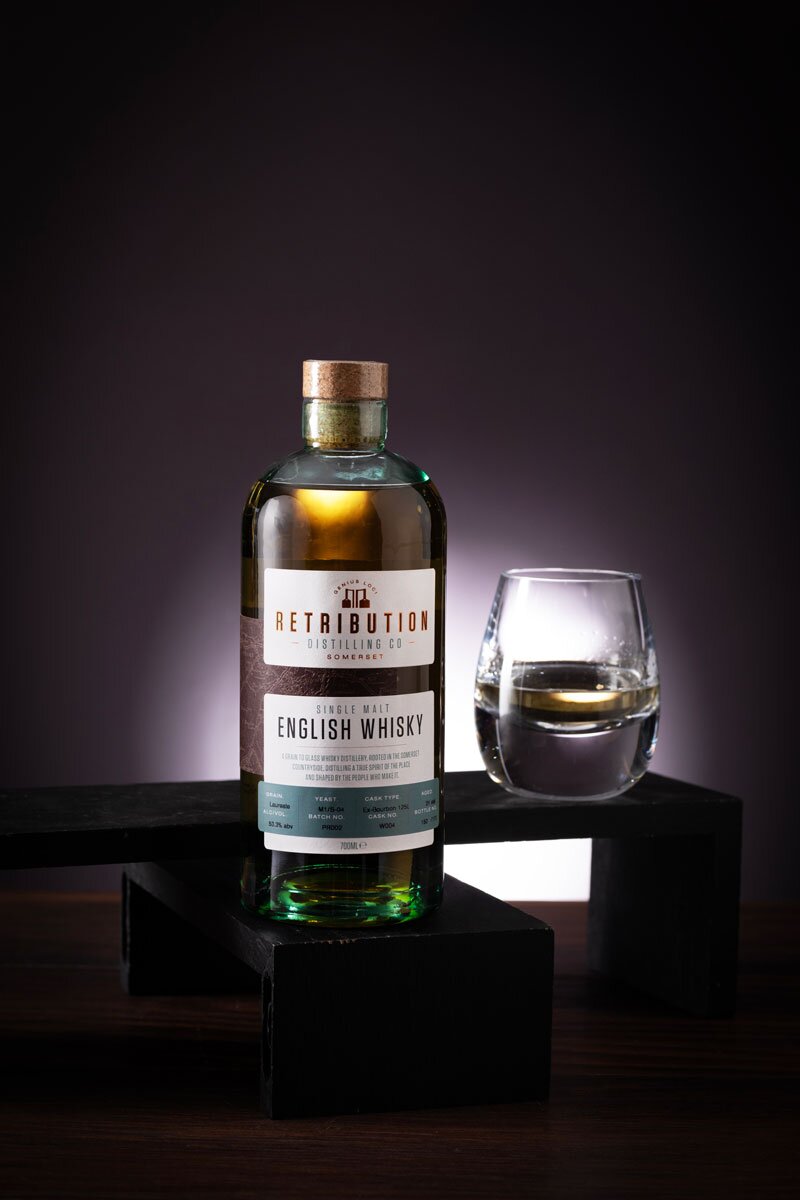 Retribution English whisky bottle and curved whisky glass